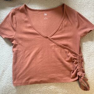 Cropped medium brownish colored top.